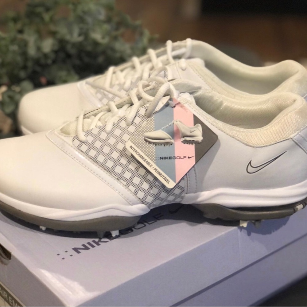 Ladies size 10.5, white Nike Air golf shoes.  Brand new in box